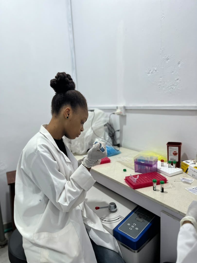 Researcher preparing samples at the bench